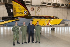 Left to Right: Chief Warrant Officer (CWO) Alain Roy, the 4 Wing Cold Lake’s CWO, Colonel Eric Kenny, 4 Wing Cold Lake’s Base Commander, Mr. Jim Belliveau, design and paint crew lead, and Captain Ryan Kean, the CF-18 Demonstration pilot, during the CF-18 Demonstration Jet unveiling ceremony held at Hangar 2, 4 Wing Cold Lake, Alberta, on April 5, 2016. Image by: Cpl Bryan Carter, 4 Wing Imaging, CK04-2016-0278-004